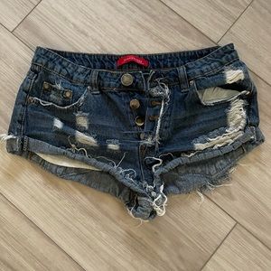 Distressed short denim shorts